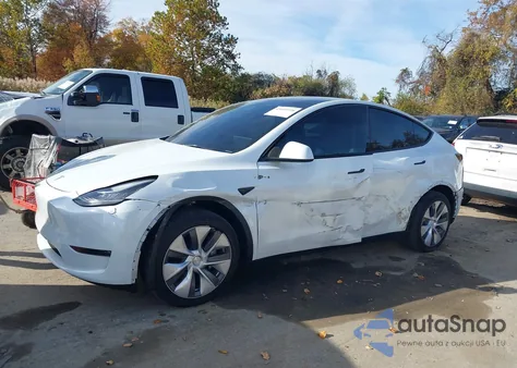 2023 Tesla Model Y Awd/Long Range Dual Motor All-Wheel Drive z USA, uszkodzony, nr VIN 7SAYGDEE8PA099530